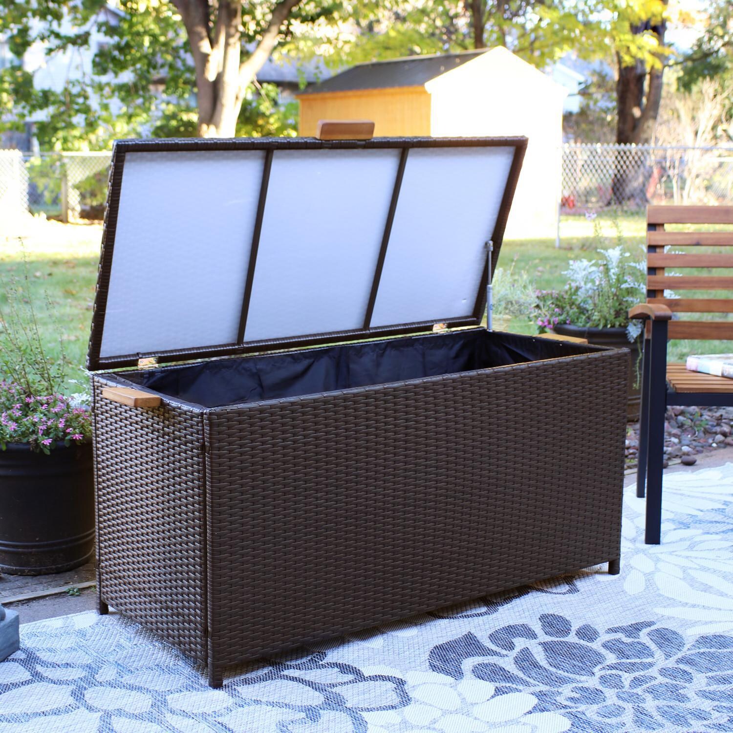 Ultimate Patio 75-Gallon Indoor/Outdoor Resin Wicker Storage Box W/ Acacia Wood Handles - Lid Open Lifestyle thumbnail