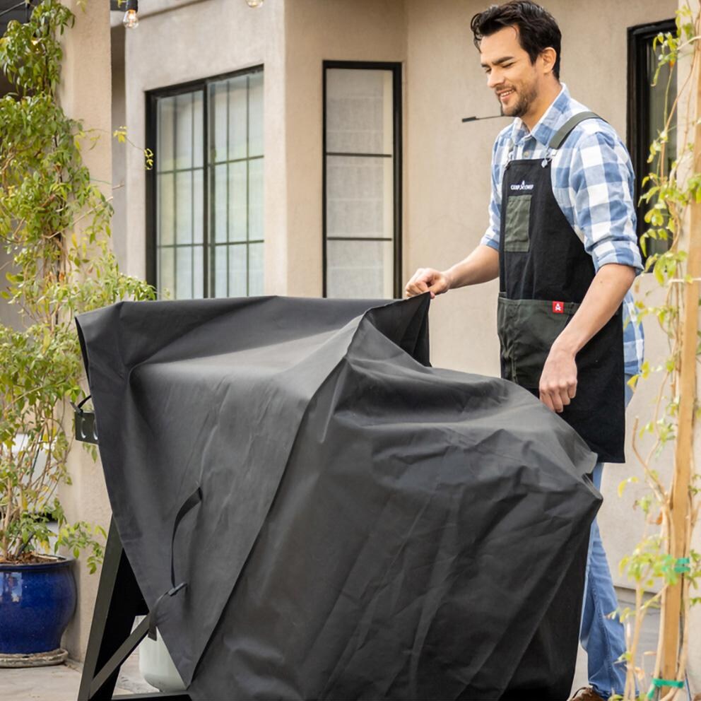 Camp Chef PC36XL GRIDIRON 36-Inch Griddle Cover - Taking off Cover - Lifestyle thumbnail