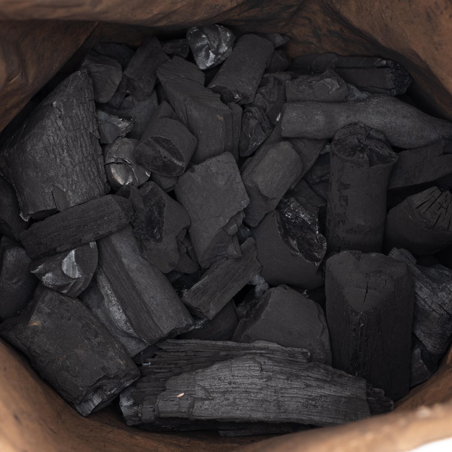 BBQGuys Signature BBQ-CHR-20 20 Lb. Natural Lump Hardwood Charcoal - Inside of Bag thumbnail