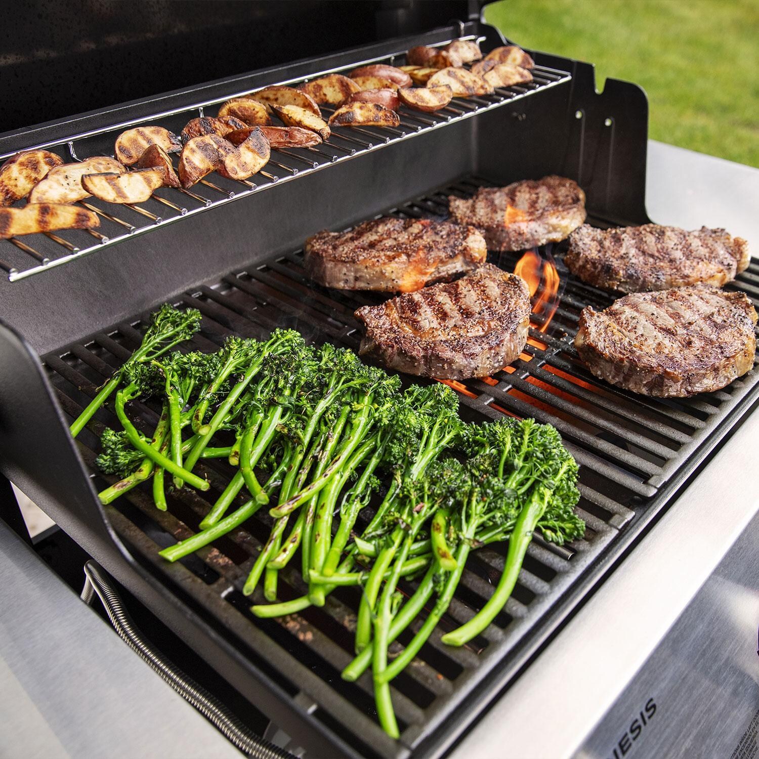 Weber GENESIS 1500011 E-315 Propane Grill - Black - Asparagus, Steaks, & Potatoes on Grill - Lifestyle