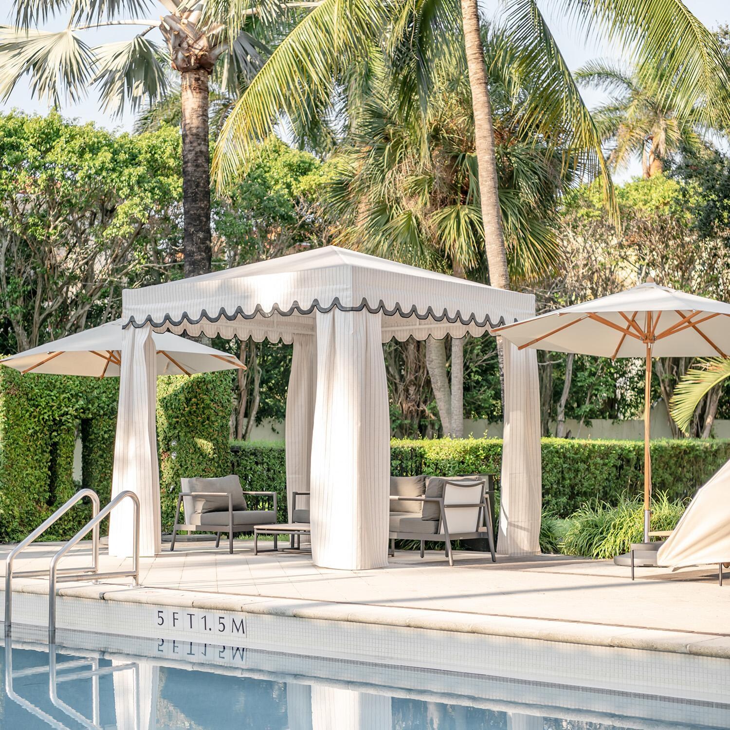 Teak + Table Paros Club Chair in Sand - Poolside - Lifestyle thumbnail