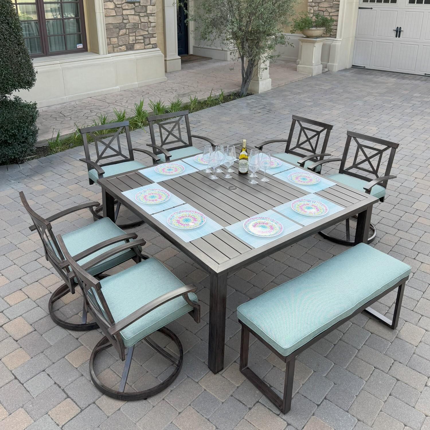 Atlantis 8 Pc Aluminum Dining Set w/ 6 Swivel Rocker Dining Arm Chairs & Two Person Bench in Walnut/Spa by Darlee - Hero - Lifestyle thumbnail