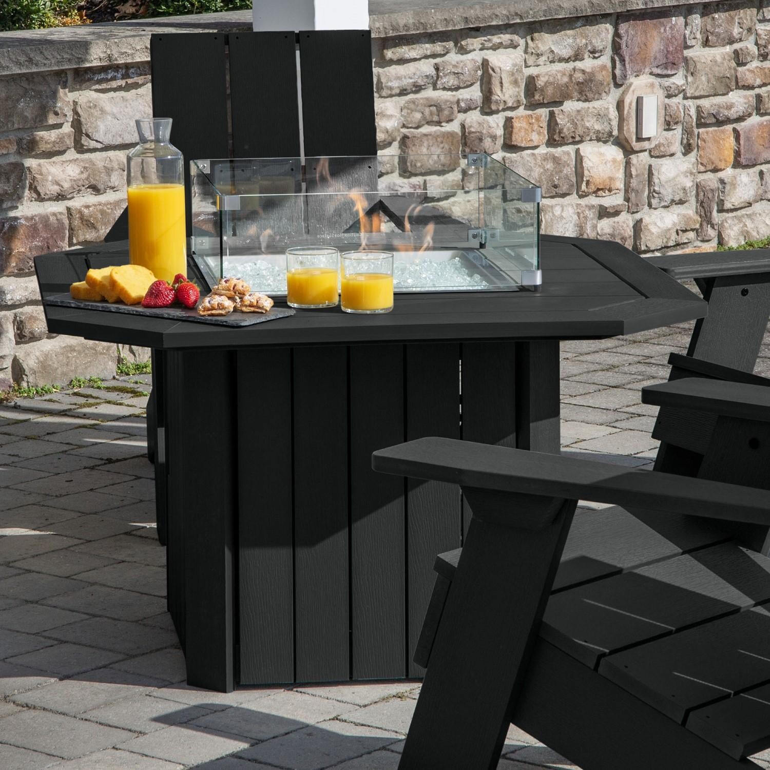 Harborview 5 Pc Adirondack Set W/ Fire Pit Table in Black by Lakeview Outdoor Designs - Side View Table - Lifestyle thumbnail