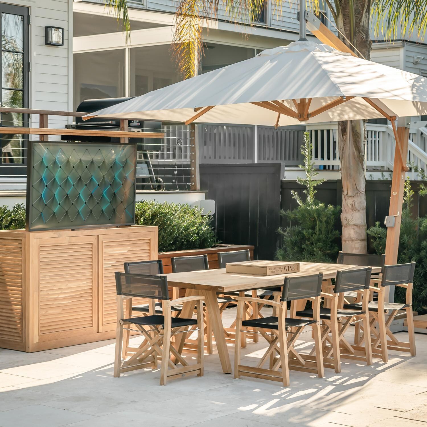 Teak + Table Monday Teak Patio Director Chair W/Black Sling - Patio - Lifestyle thumbnail