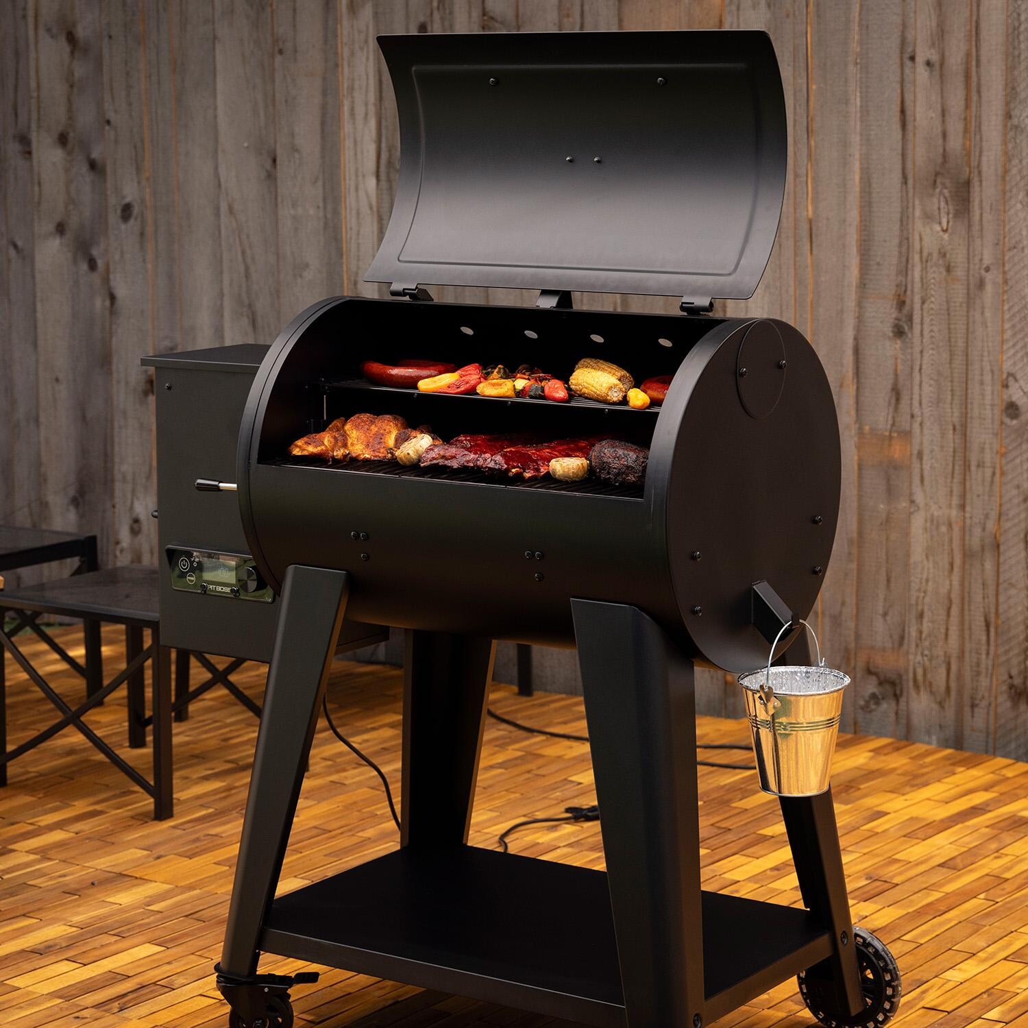 Pit Boss 850FB2 Pellet Grill - Matte Black - Open Angled Left - Lifestyle thumbnail