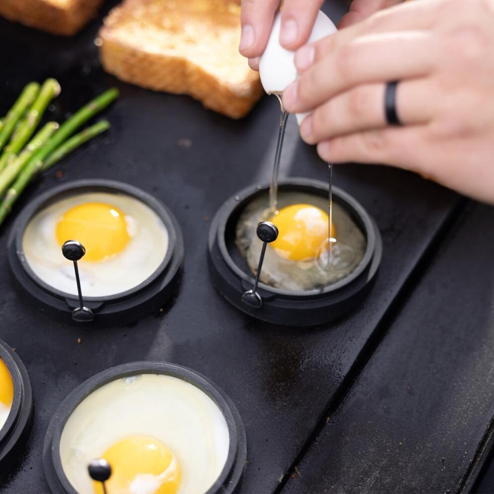 Camp Chef BFSET6 6 Pc Breakfast Kit - Cracking Egg in Mold - Detail thumbnail