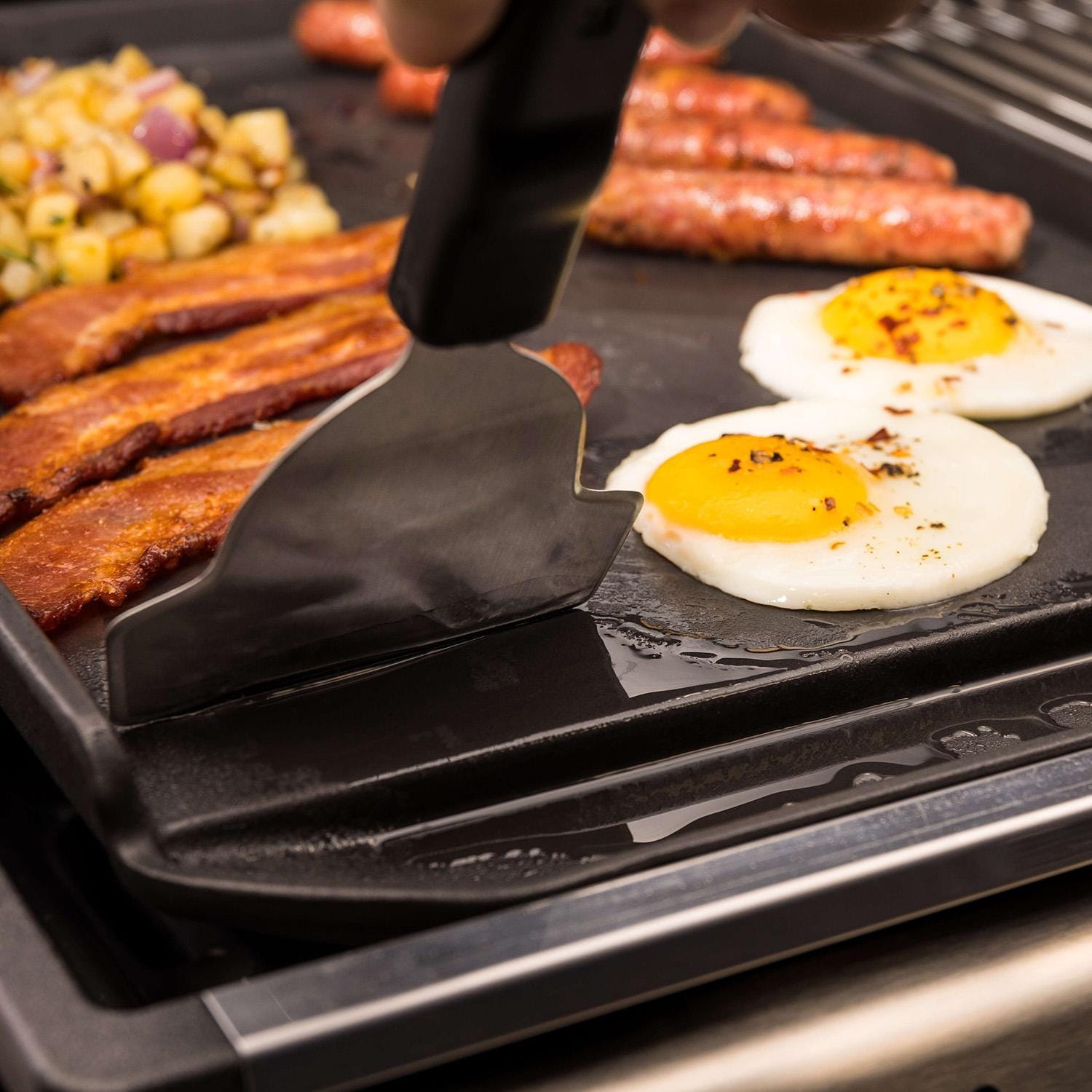 Broil King Plancha Grill Scraper - 64039 - In Use on Grease - Lifestyle thumbnail