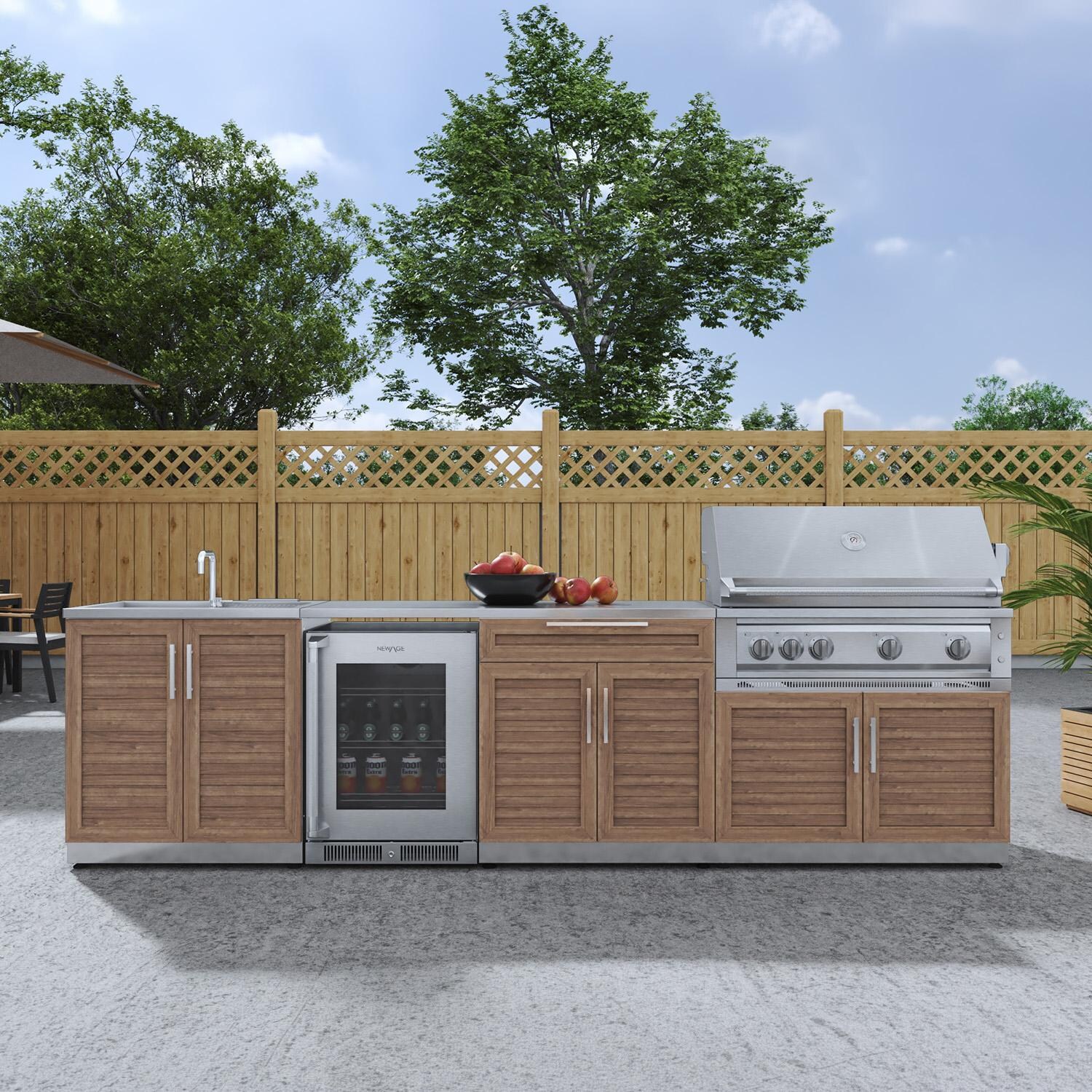 NewAge Products 66393 Classic Series 10 1/2 Ft Outdoor Kitchen Island w/ 40-in Propane Grill, Sink, Glass Door Refrigerator, Trash Bin, Door & Drawer in Grove/Stainless Steel - On Patio - Lifestyle thumbnail