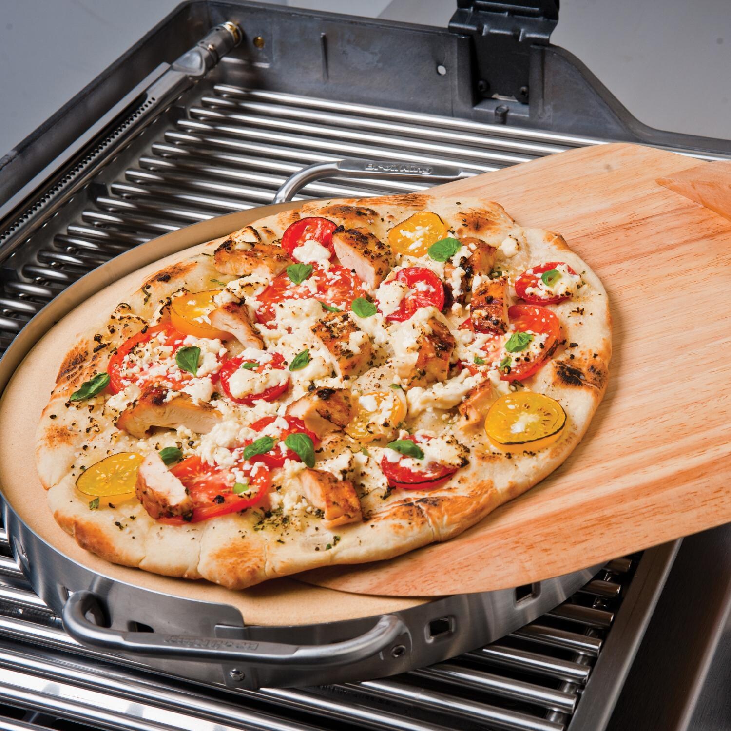 Broil King 13-Inch Ceramic Pizza Stone With Stainless Steel Cradle & Pizza Peel - 2-Pieces