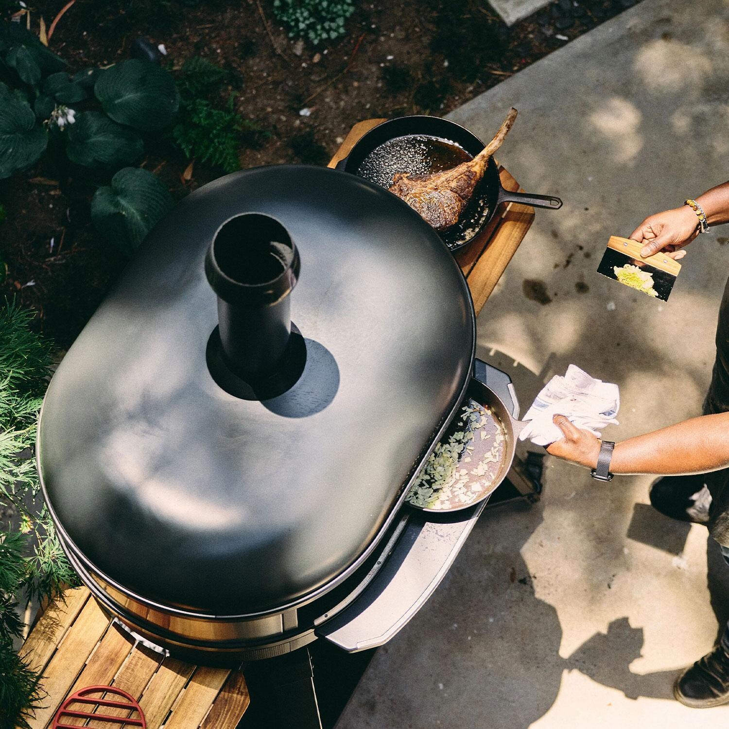 Gozney GMNOBUS1826 Dome XL Gen 2 Natural Gas Pizza Oven - Off Black - Overheard View - Lifestyle thumbnail