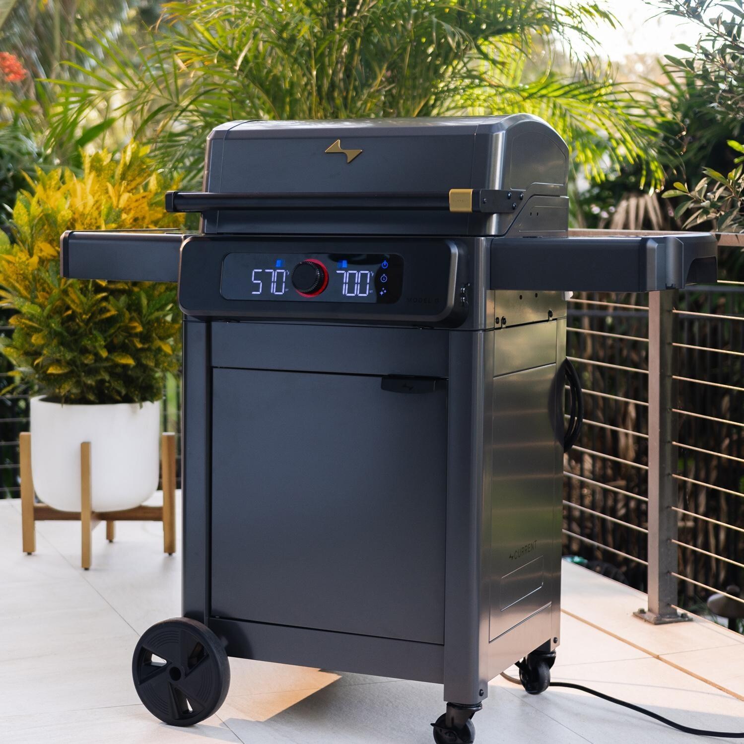 Current 24653014BC Model G Dual Zone Electric Grill W/ Cabinet in Black - Angled Patio - Lifestyle thumbnail