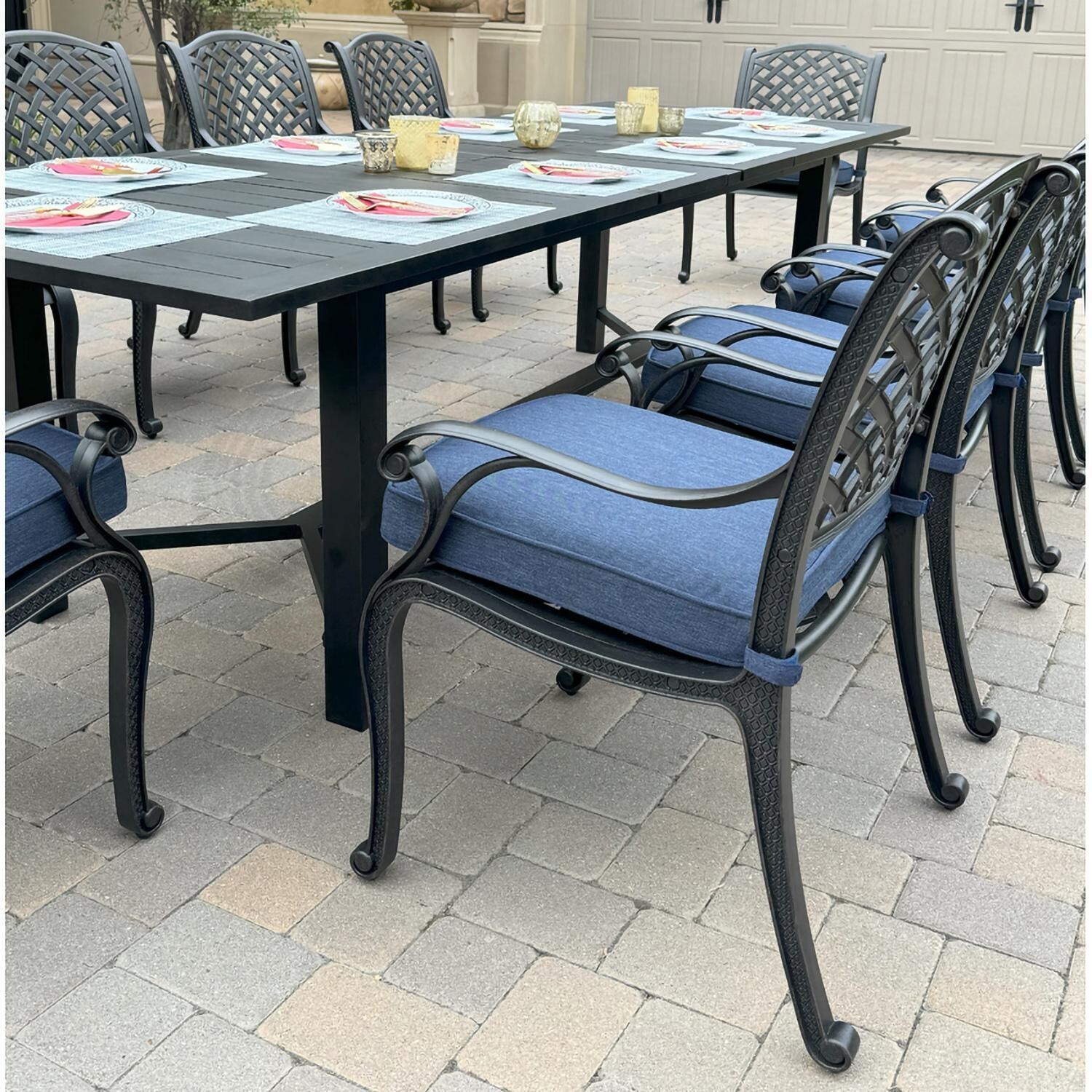Darlee B/DL13-11PCD-2350LE-N Nassau 11 Pc Cast Aluminum Dining Set in Antique Bronze w/ Navy Cushions - Chair Angle - Lifestyle thumbnail