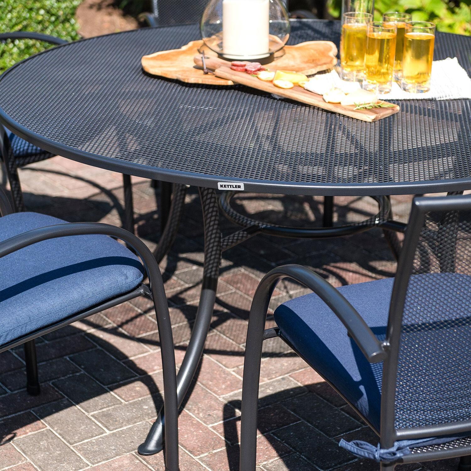 Pilano 7 Pc Steel Round Dining Set in Gray By KETTLER - Dining Table - Close Up - Lifestyle thumbnail