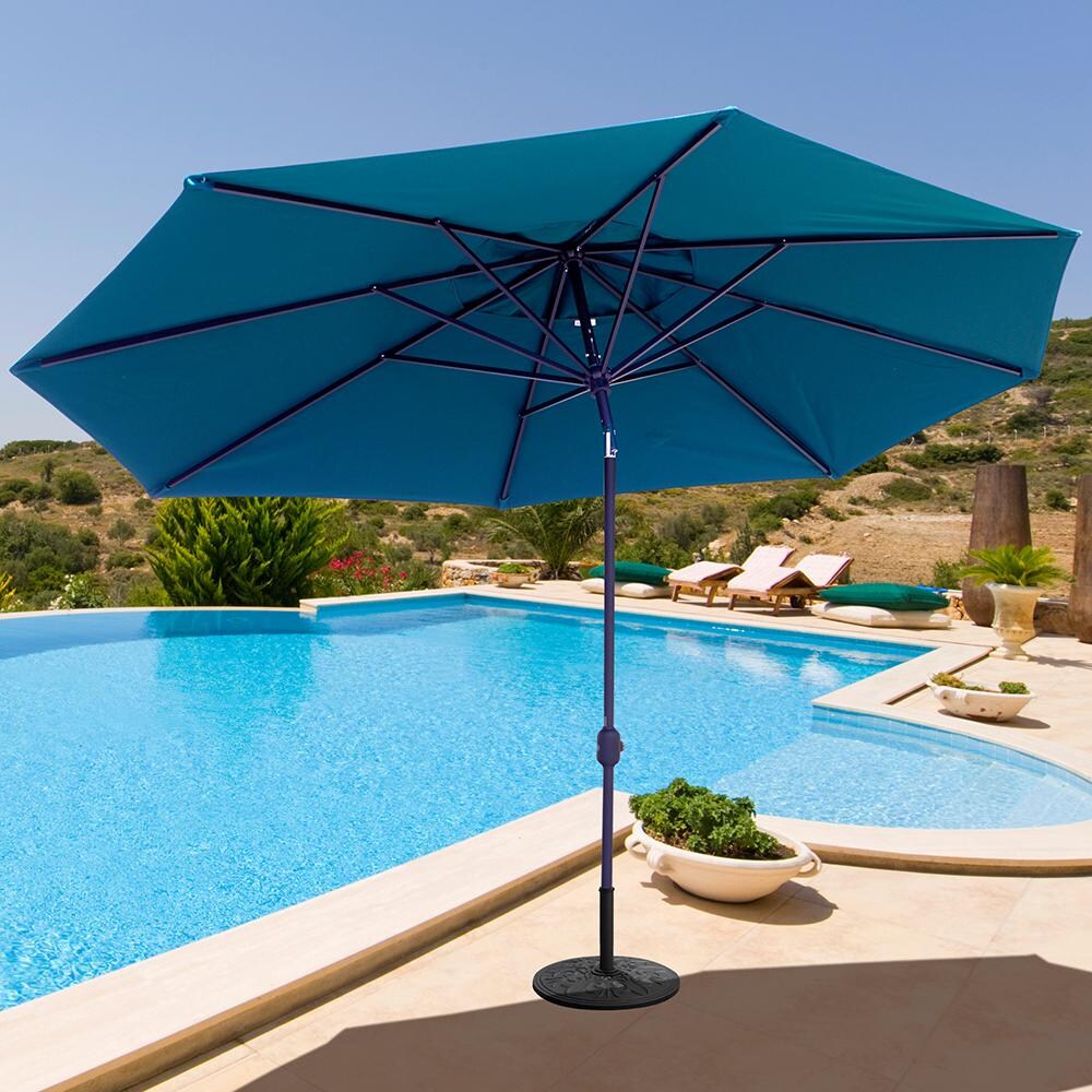 Galtech 11 X 8 Ft. Oval Patio Umbrella W/ Crank Lift - Lifestyle View - Shown In Black Finish W/ Forest Green Sunbrella Fabric (Umbrella Base Not Included) thumbnail