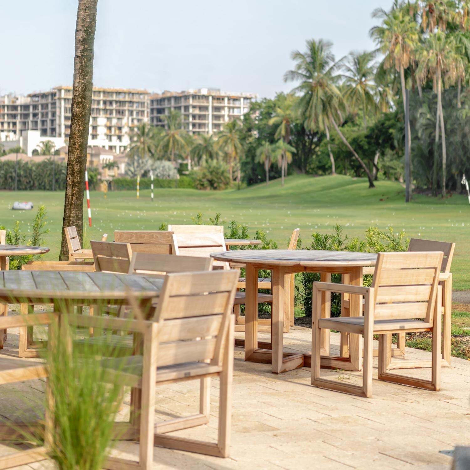 Teak + Table Relax 5 Piece Teak Dining Set W/ Round Table - Lifestyle thumbnail