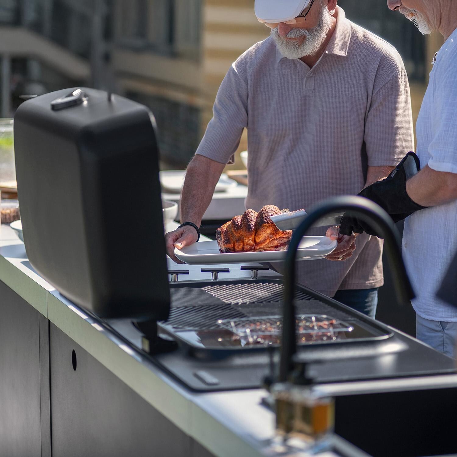 Everdure 9 Ft Outdoor Kitchen Island w/ Marine Grade Aluminum Cabinets in Black - Cooking on Grill w/ Sink - Lifestyle thumbnail