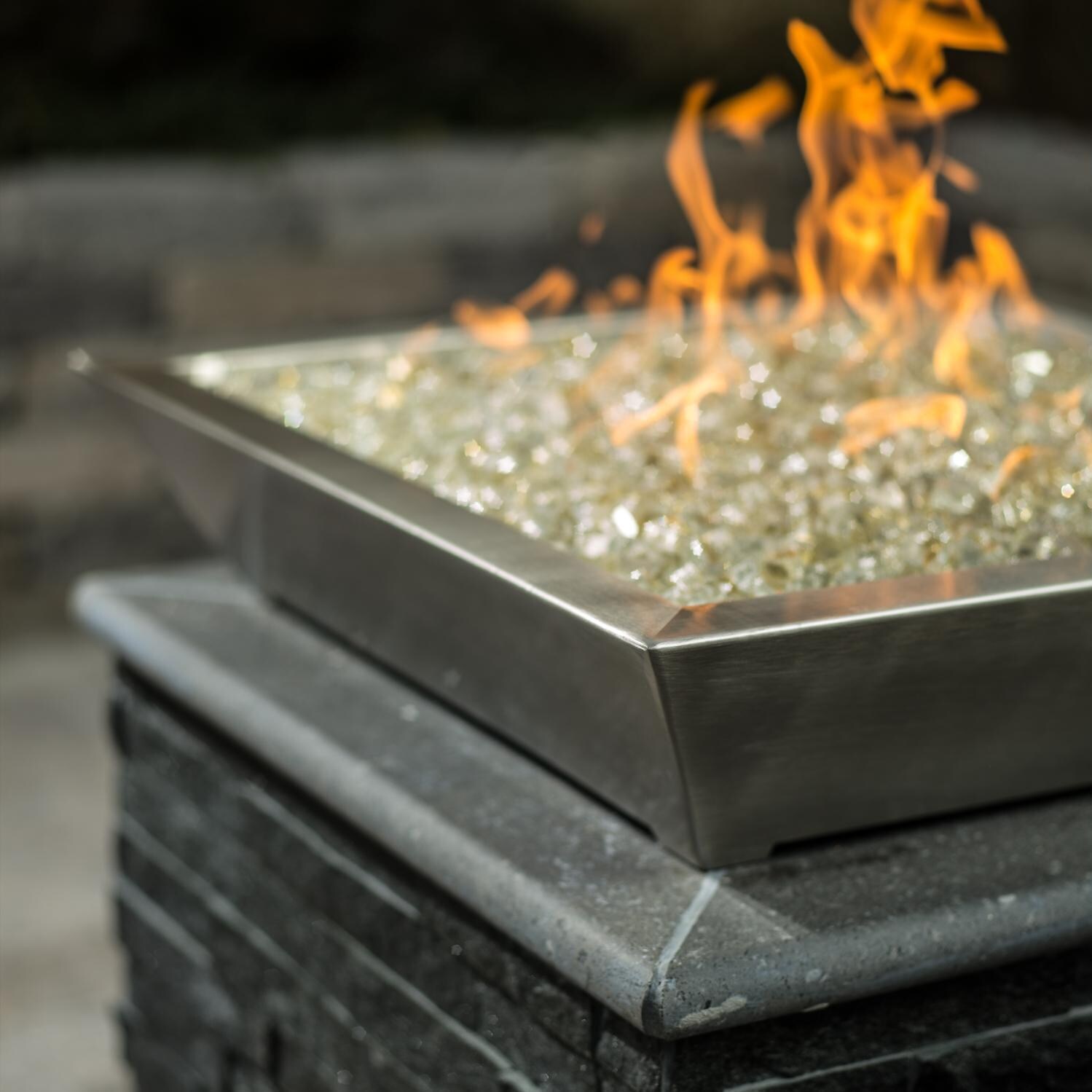 BBQGuys Signature Series Westfalen 24-Inch Square Low-Rise Natural Gas Fire Bowl - Stainless Steel - Angled - Shown with 1/2 inch White Gold Reflective Fire Glass thumbnail