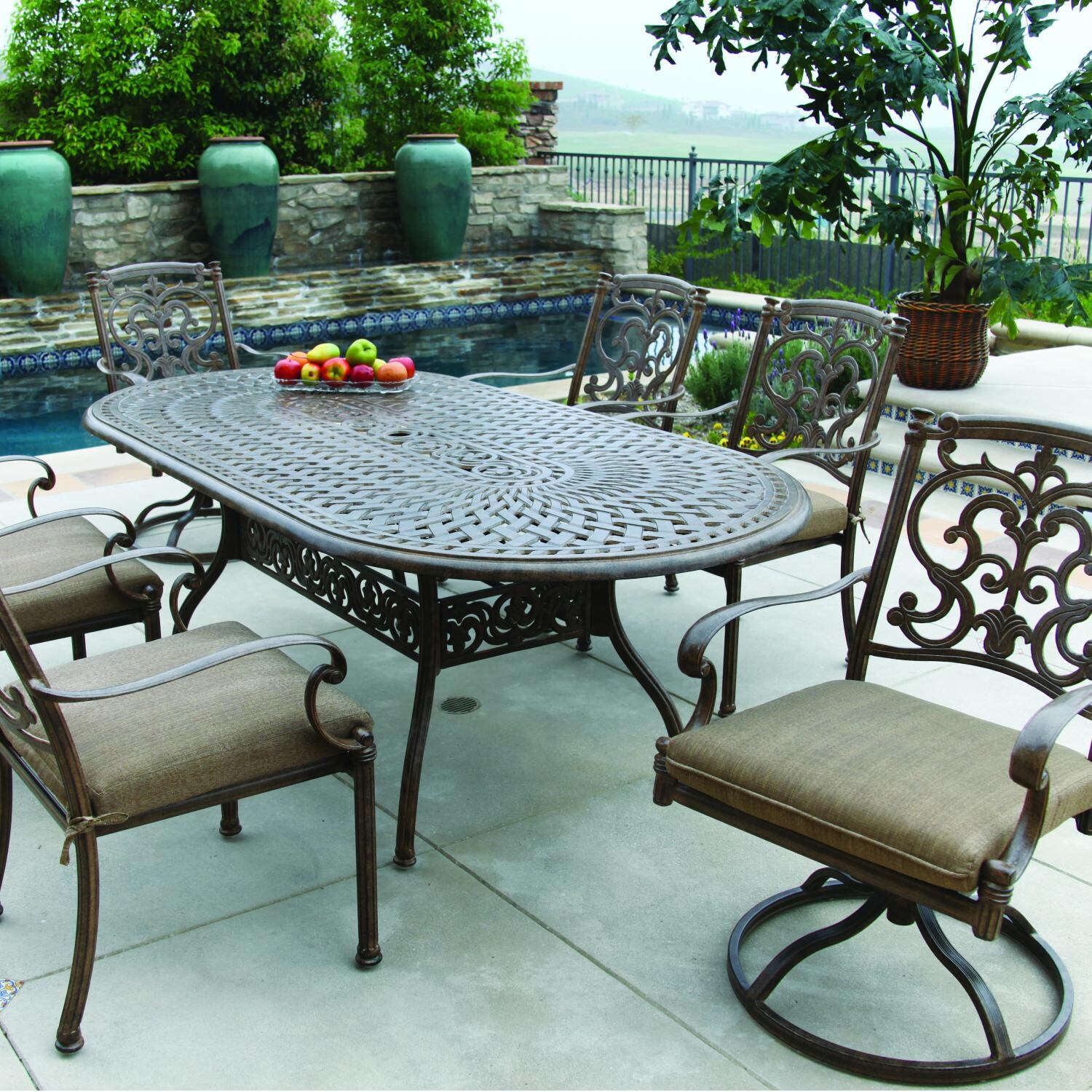 Santa Barbara 7 Pc Cast Aluminum Dining Set w/ 84 X 42 Inch Oval Series 60 Table & 2 Swivel Rockers in Antique Bronze/Sesame by Darlee