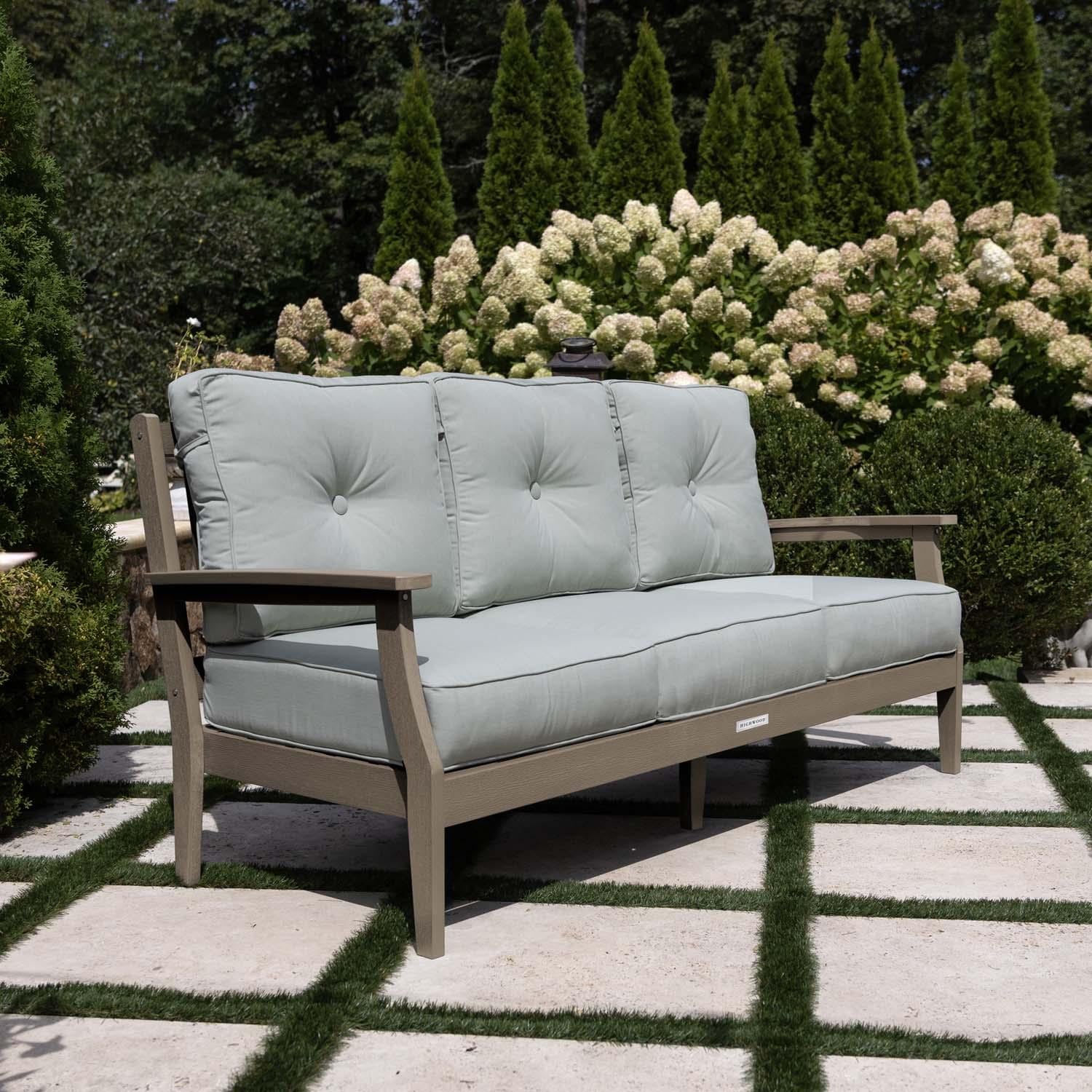 Blushing Bay 3 Person Recycled Plastic Sofa in Canvas Seasalt/Woodland Brown by Lakeview Outdoor Designs - Side View - Lifestyle thumbnail