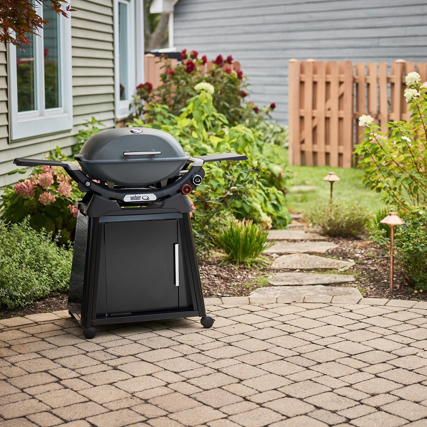 Weber 1500393 Q2800N+ Propane Gas Grill in Charcoal Grey - Lifestyle thumbnail