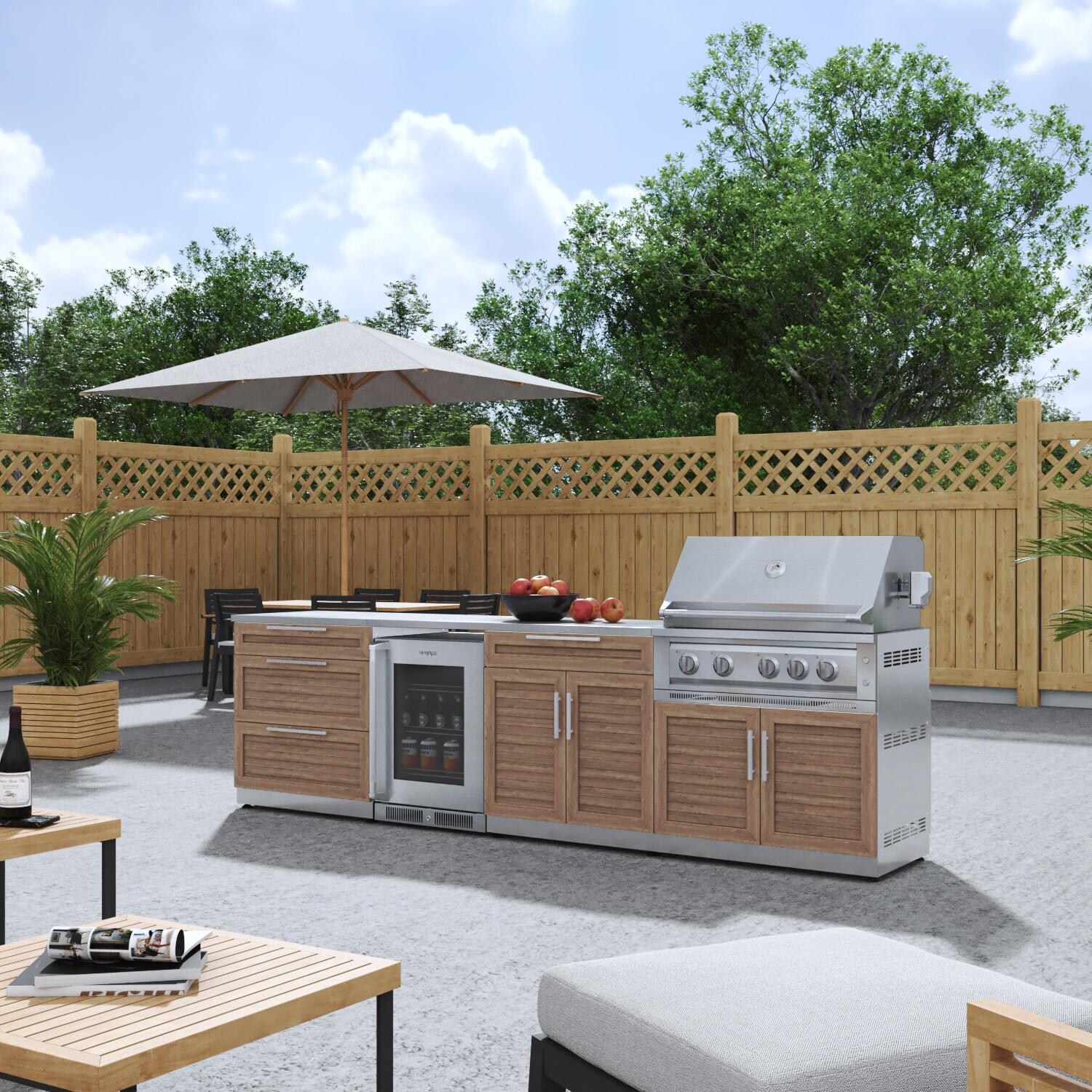 NewAge Products 67914 Classic Series 10 1/2 Ft Outdoor Kitchen Island w/ 36-in Propane Grill, Glass Door Refrigerator, Trash Bin, Door & Drawer in Grove/Stainless Steel - Angled on Patio - Lifestyle thumbnail