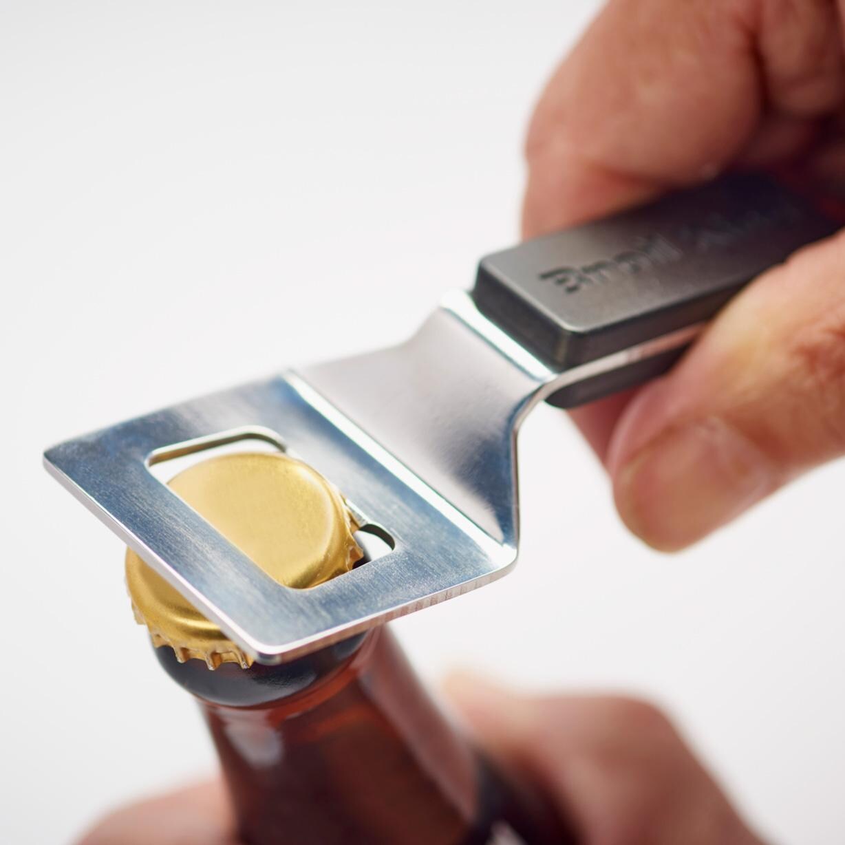 Broil King Stainless Steel Bottle Opener - 64009 - Opening Bottle 2 - White Background thumbnail