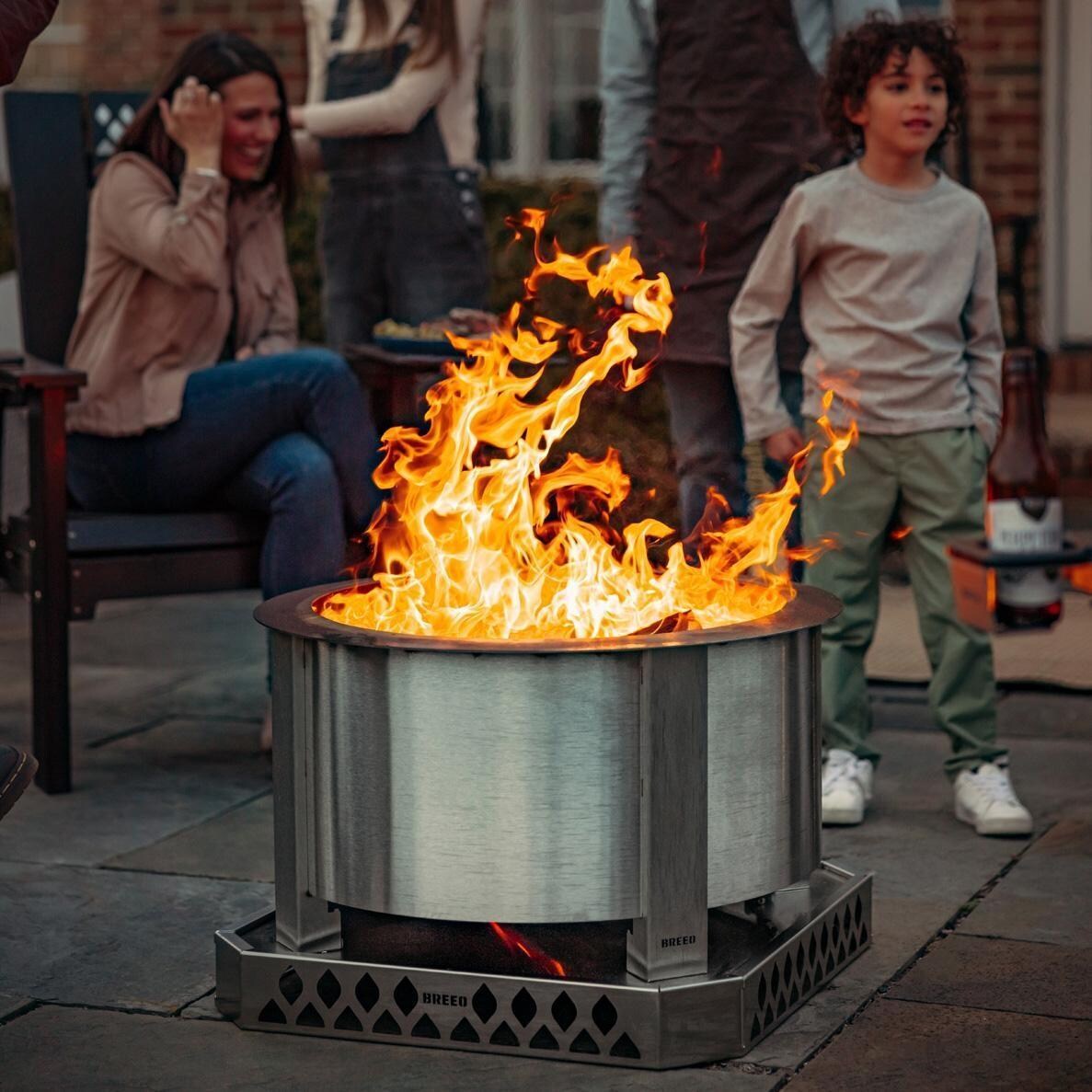 Breeo BR-X24S X Series 24 Inch Smokeless Round Stainless Steel Wood Burning Fire Pit - On the Patio Up Close - Lifestyle thumbnail