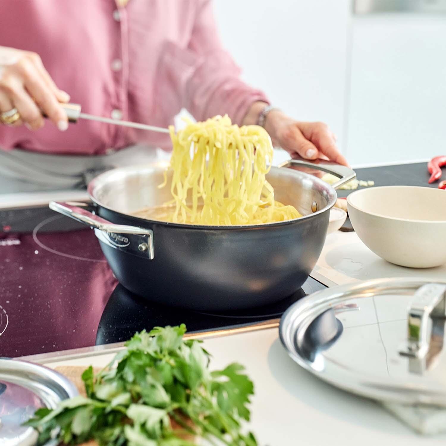 Demeyere 1026913 Black 5 Stainless Steel 3.5 Qt Dutch Oven W/Lid - Cooking Pasta - Lifestyle thumbnail