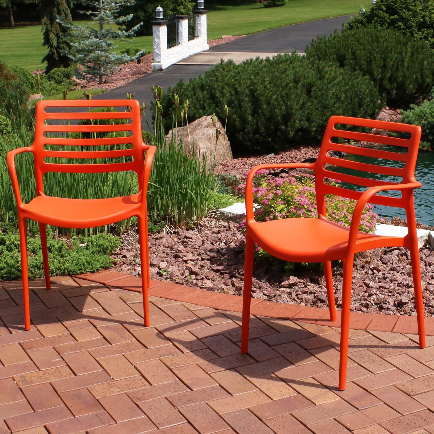 Ultimate Patio Plastic Stacking Patio Armchair thumbnail
