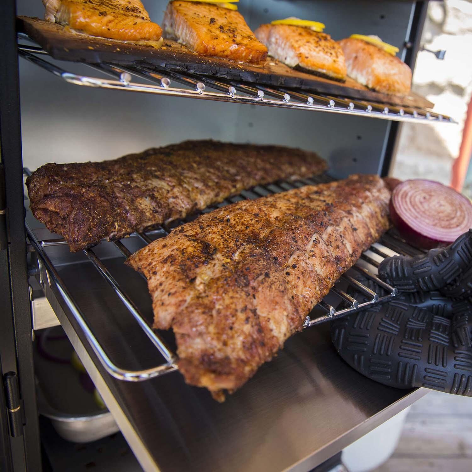 Broil King 28-Inch Smoke Vertical Propane Gas Smoker - Black - Ribs and Fish - Lifestyle thumbnail