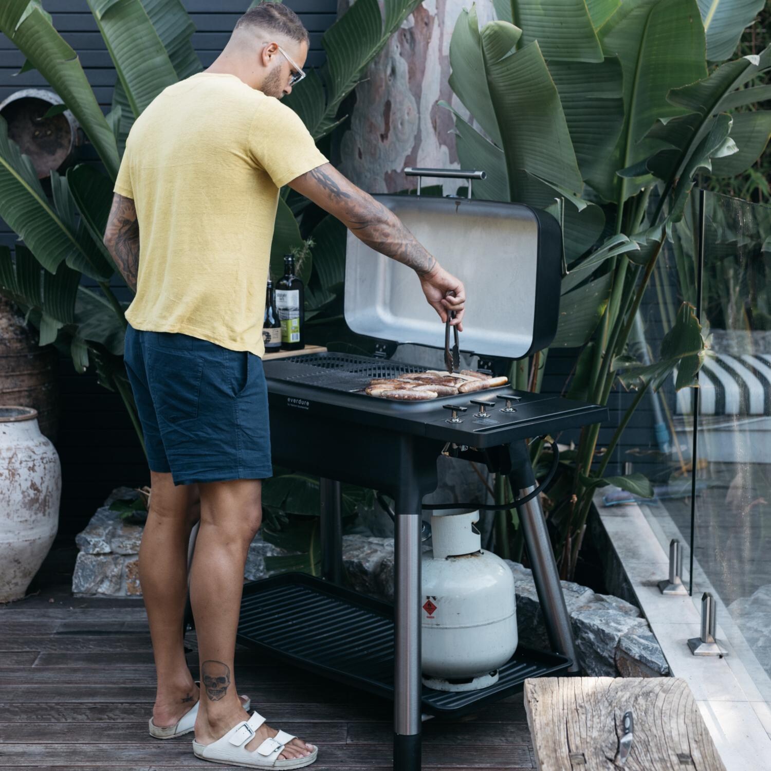 Everdure HBG3BUS FURNACE 52-Inch 3-Burner Propane Gas Grill With Stand - Grilling Sausages thumbnail