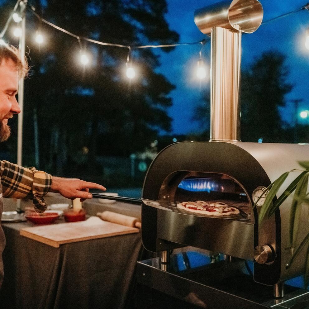 Fontana Forni FFMAES60 Fontana Forni Maestro 60 Gas Fired Pizza Oven - FFMAES60 - On the Patio - Lifestyle thumbnail