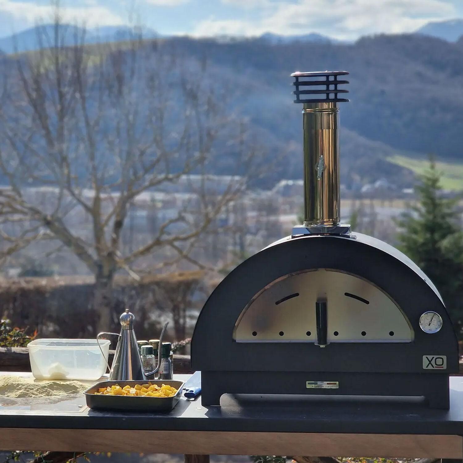 XO Appliance XOPIZZA1CA PIZZA1 Countertop Wood-Fired Pizza Oven in Carbona - Lifestyle thumbnail