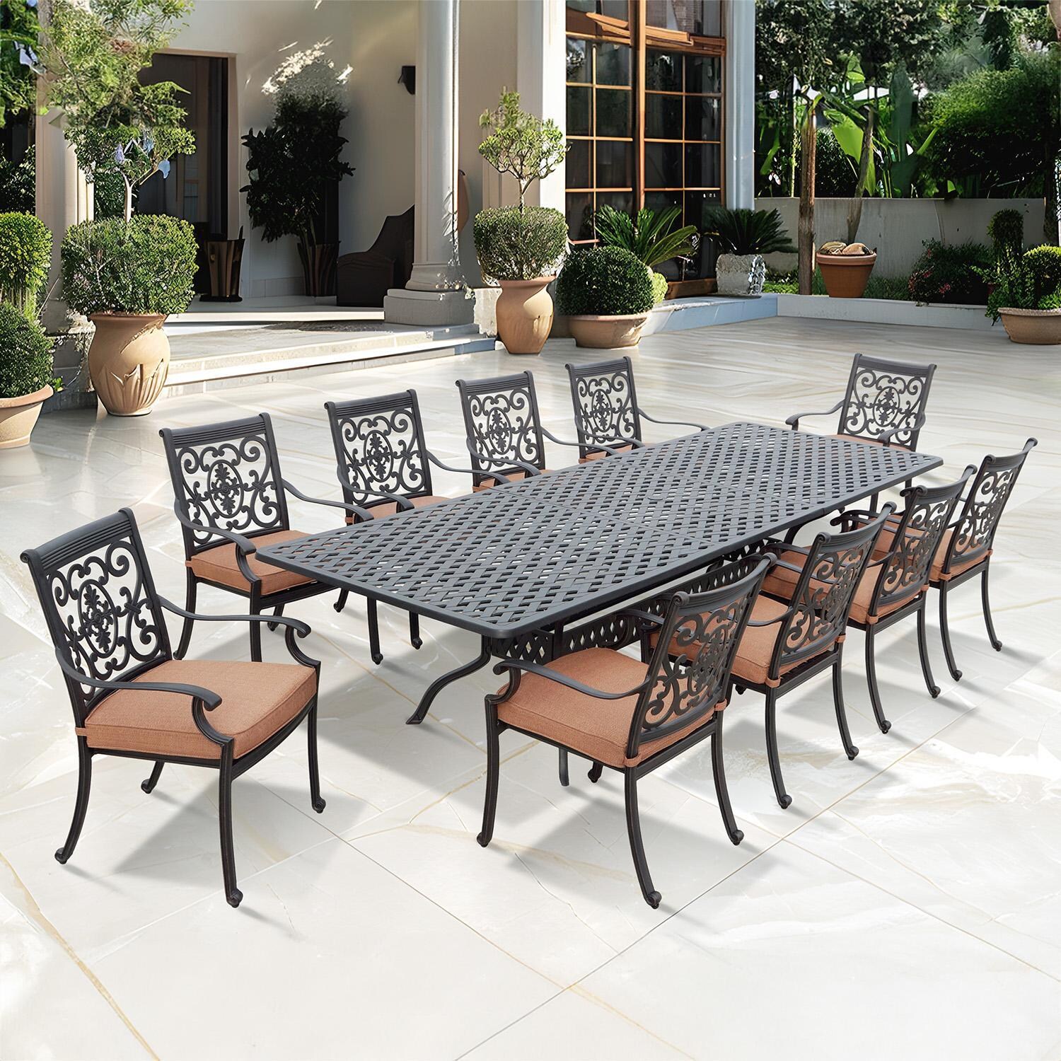 St. Cruz 11 Pc Cast Aluminum Dining Set w/ 92 X 42 Inch Series 30 Extension Table in Antique Bronze/Spicy Chili by Darlee
