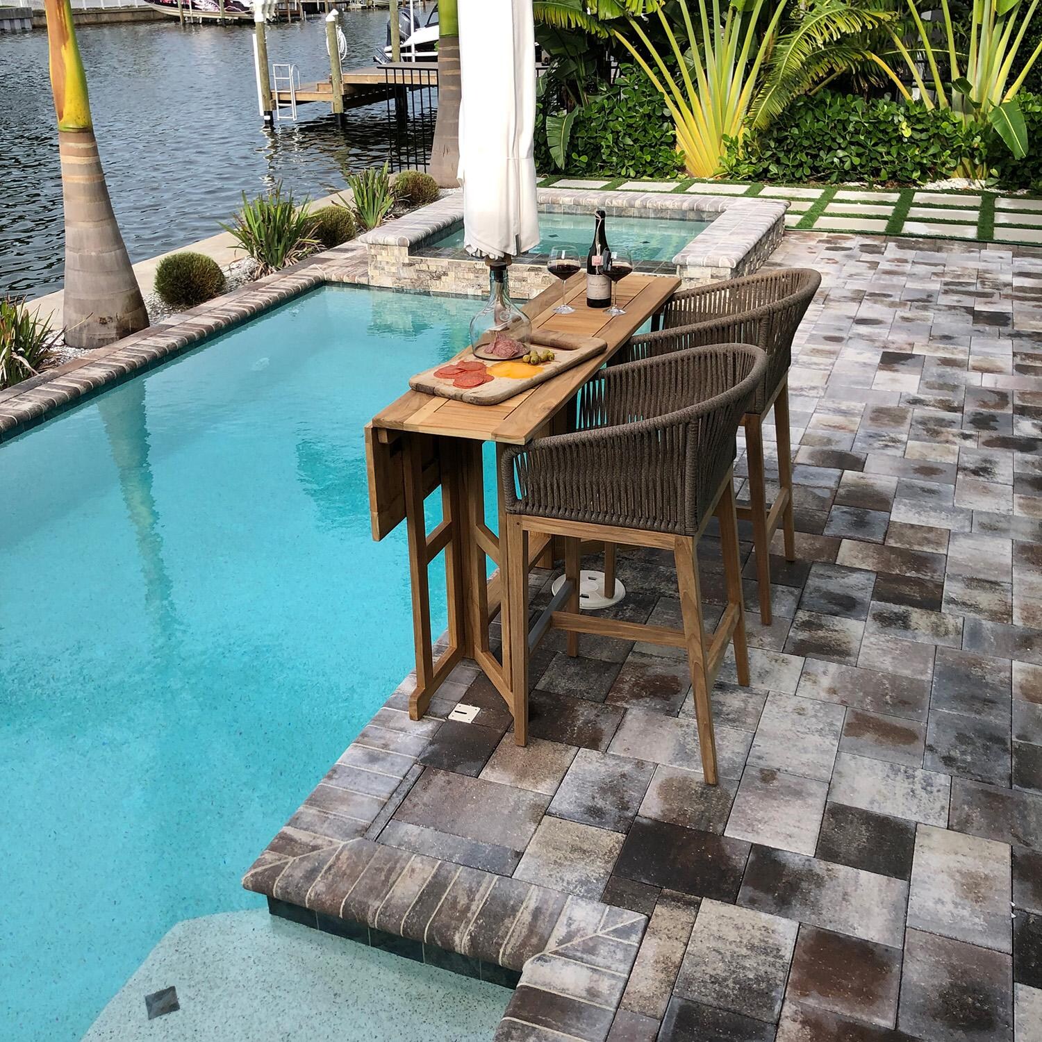 Royal Teak Collection BTDL64 Admiral 64 Inch Rectangular Teak Bar Table w/ Drop Leaf - One Side Down (Shown w/ Chairs Sold Separately) - Lifestyle thumbnail