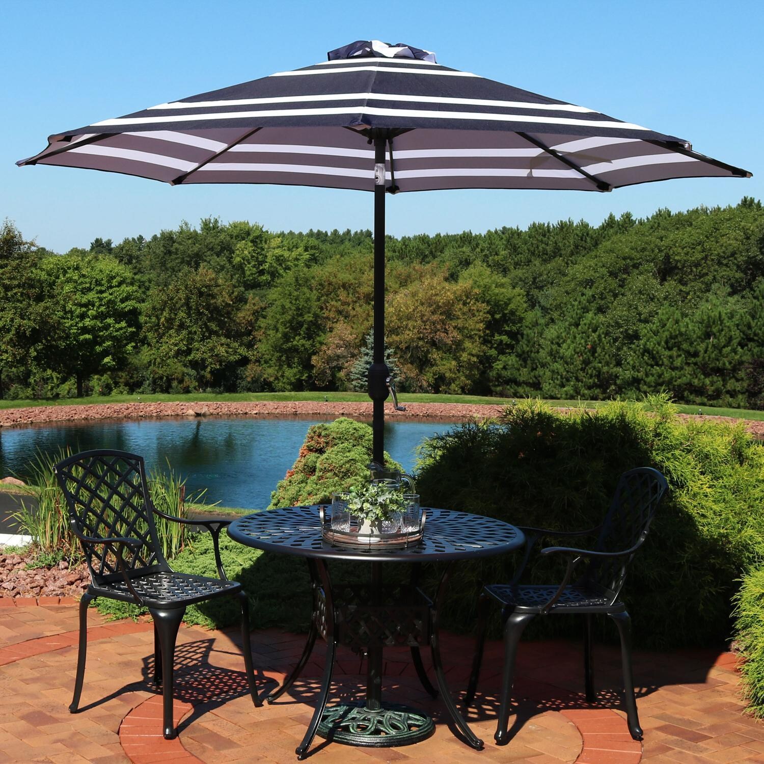 Ultimate Patio 9 Ft. Octagonal Patio Umbrella W/ Crank & Tilt - Navy Blue Stripe - Lifestyle View thumbnail