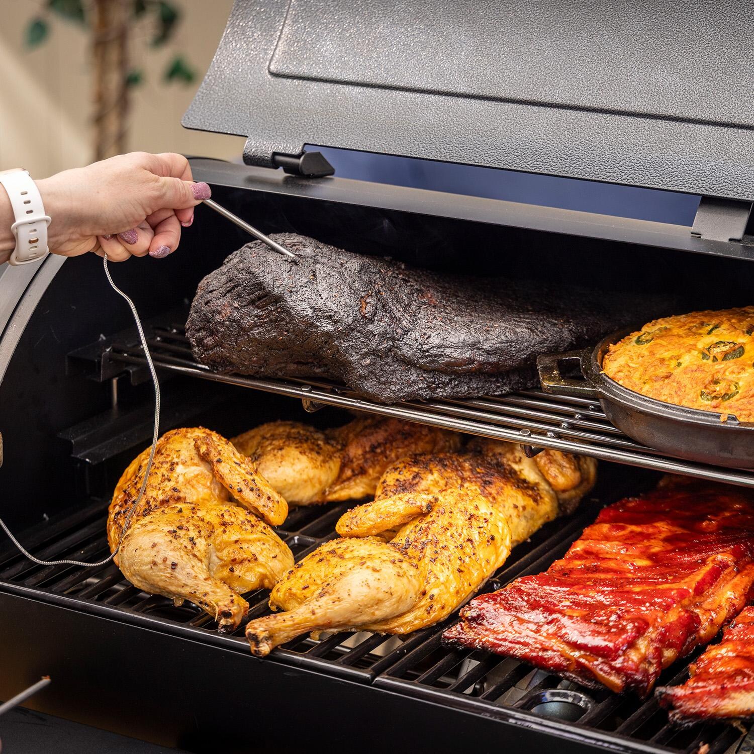 Pit Boss 11106 Sportsman 850 Pellet Grill w/ WiFi - Checking Temperature w/ Probe - Detail thumbnail