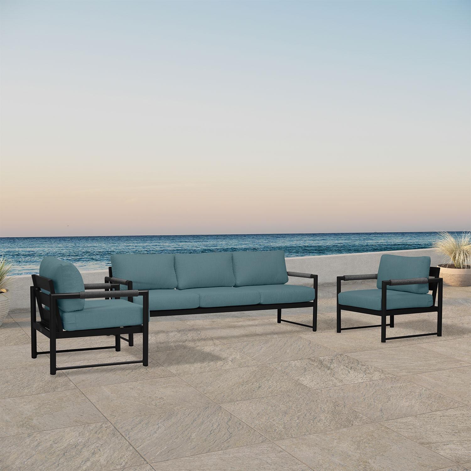 Lakeview AVEBAY-BK-CO-SET141-CL Avenue Bay Black/Carbon 3 Pc Sofa Club Chair Set - Cast Lagoon - Angled On Patio - Lifestyle thumbnail