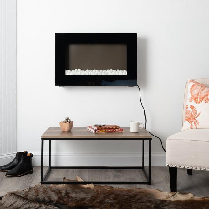 Fire Sense 31-Inch Wall Mount Electric Fireplace - Black - 60757 - Lifestyle with Rocks - Fireplace Off thumbnail