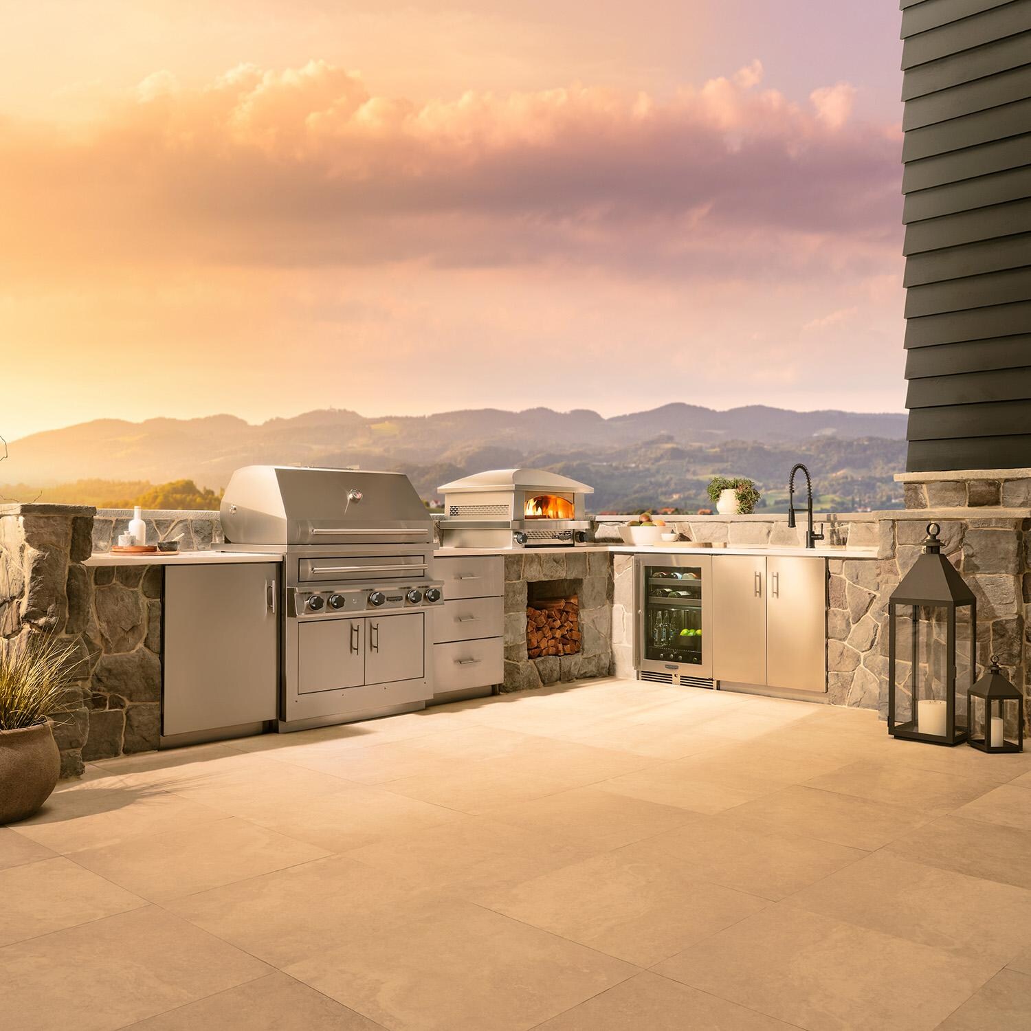 Kalamazoo AFPO-C Countertop Artisan Fire Pizza Oven - Wide View in Outdoor Kitchen w/ K750HB Hybrid Fire Grill thumbnail