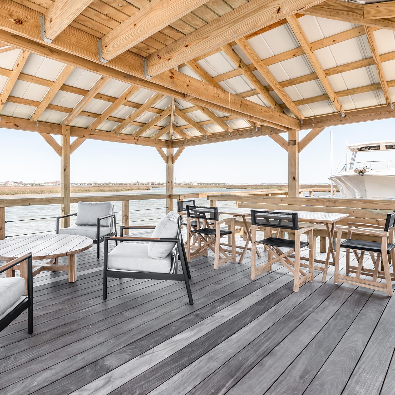 Teak + Table Paros Club Chair in Sand - Dock - Lifestyle thumbnail