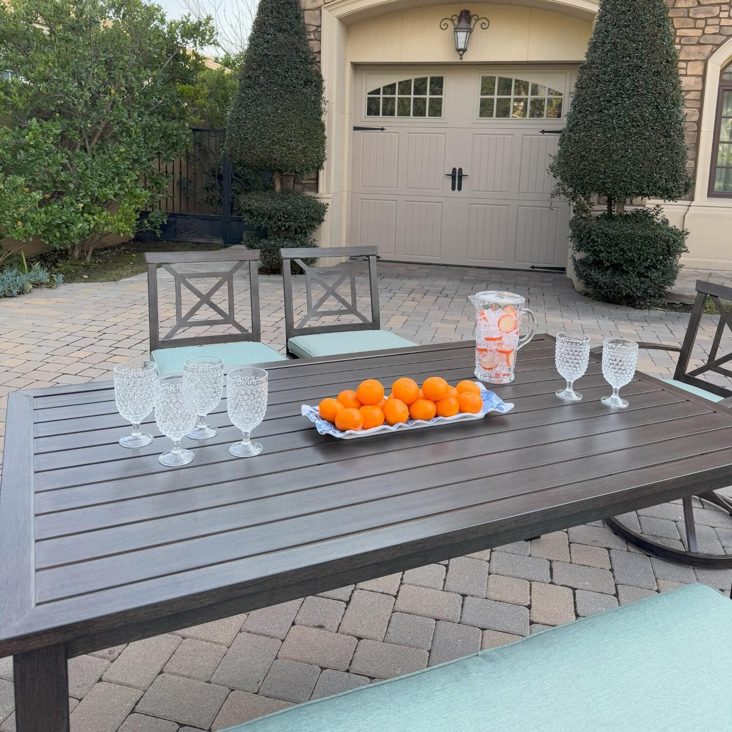 Atlantis 6 Pc Aluminum Dining Set w/ 2 Dining Side Chairs, 2 Swivel Rocker Dining Arm Chairs & Two Person Bench in Walnut/Spa by Darlee - Table Angled - Lifestyle thumbnail