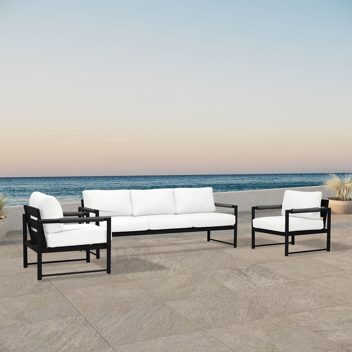 Lakeview AVEBAY-BK-CO-SET141-CN Avenue Bay Black/Carbon 3 Pc Sofa Club Chair Set - Canvas Natural - Angled On Patio - Lifestyle thumbnail