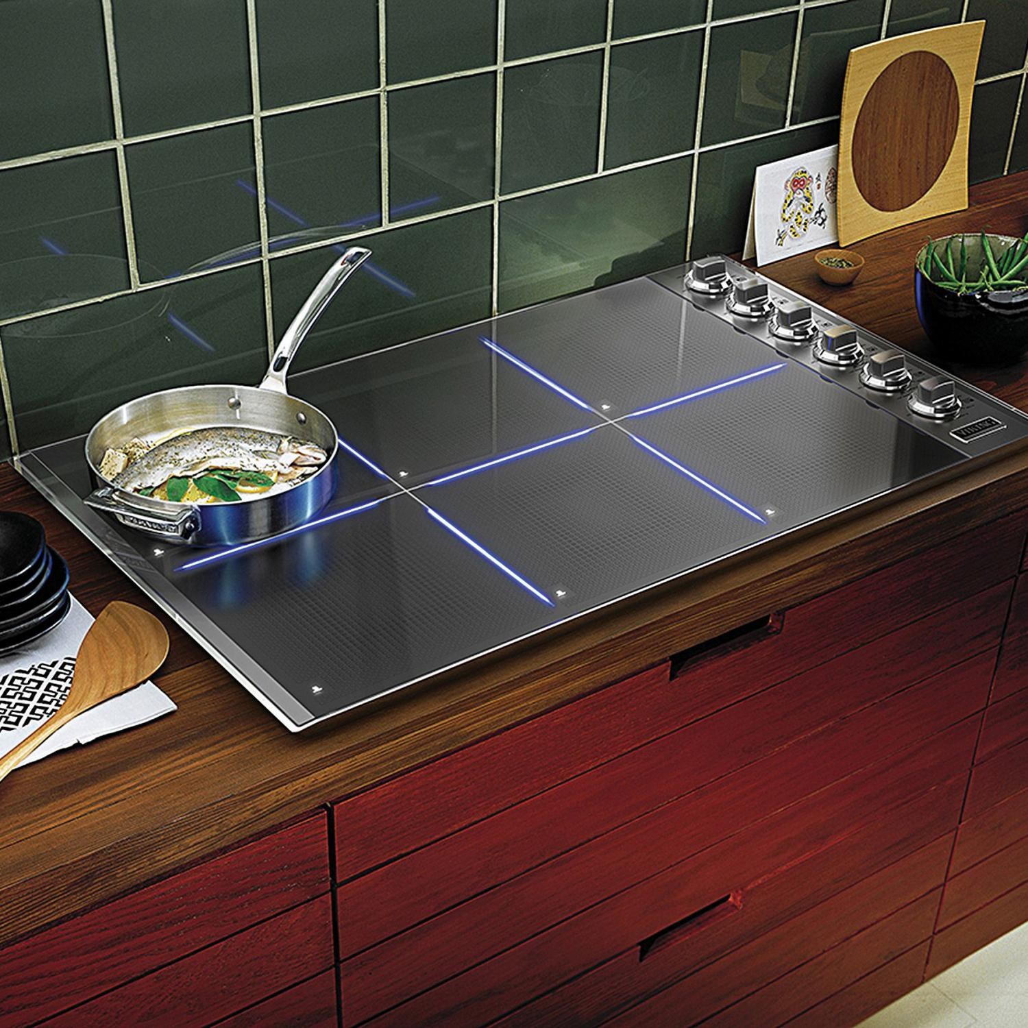 Viking Professional 5 Series 36-Inch 6-Burner Induction Cooktop - Shown Built-In and In Use thumbnail