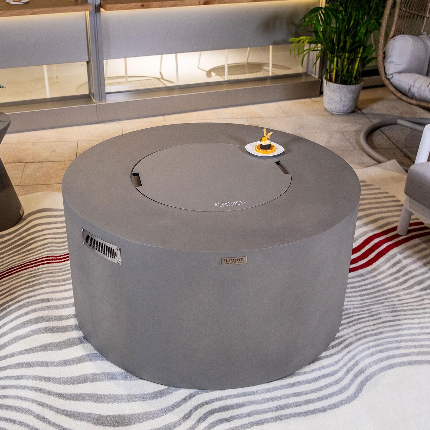 Elementi OFG311LG-LP Pacaya 43-in Liquid Propane Concrete Fire Table w/ Hidden Tank in Light Grey - Lid On - Lifestyle thumbnail