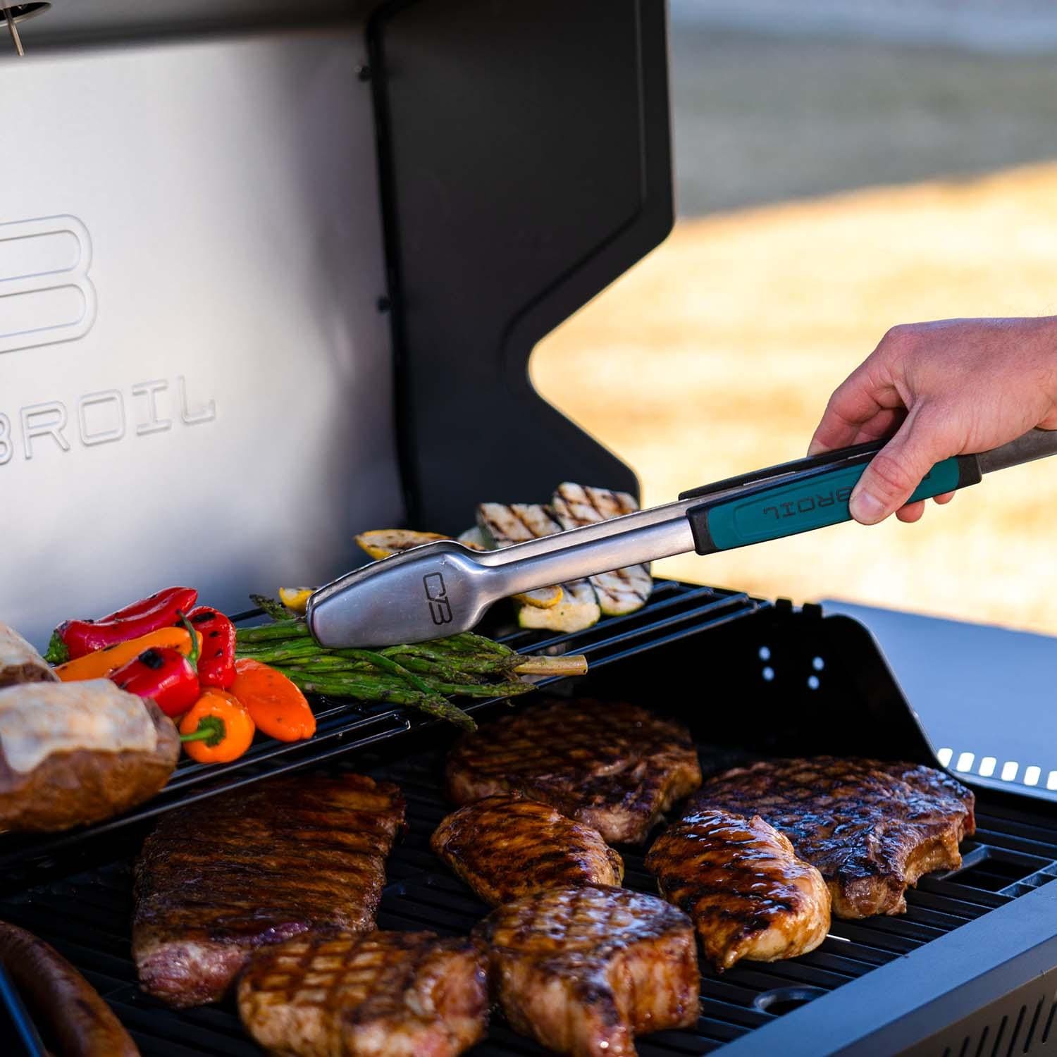 Charbroil 463463025 5-Burner Propane Grill - Black - In Use - Lifestyle thumbnail