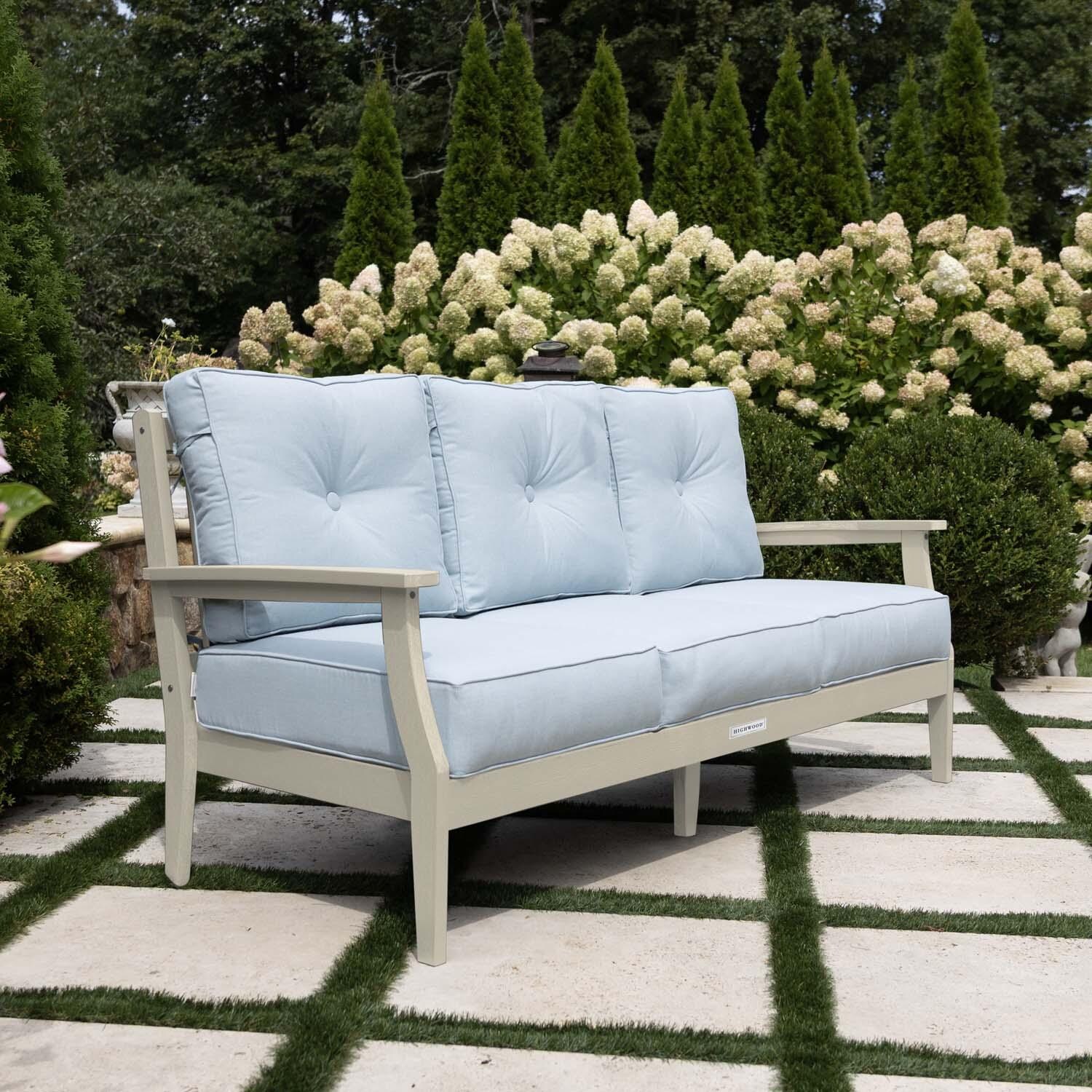 Blushing Bay 3 Person Recycled Plastic Sofa in Bliss Dew/Whitewash by Lakeview Outdoor Designs - Side View - Lifestyle thumbnail