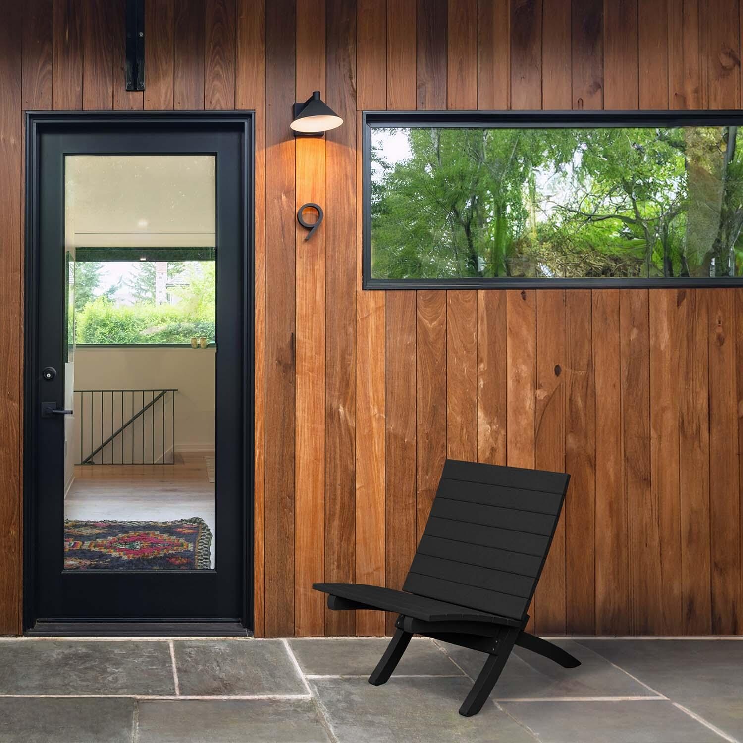 Hazel Cove Recycled Plastic Folding & Stacking Dining Side Chair in Black Sand by Lakeview Outdoor Designs - By Door - Lifestyle thumbnail