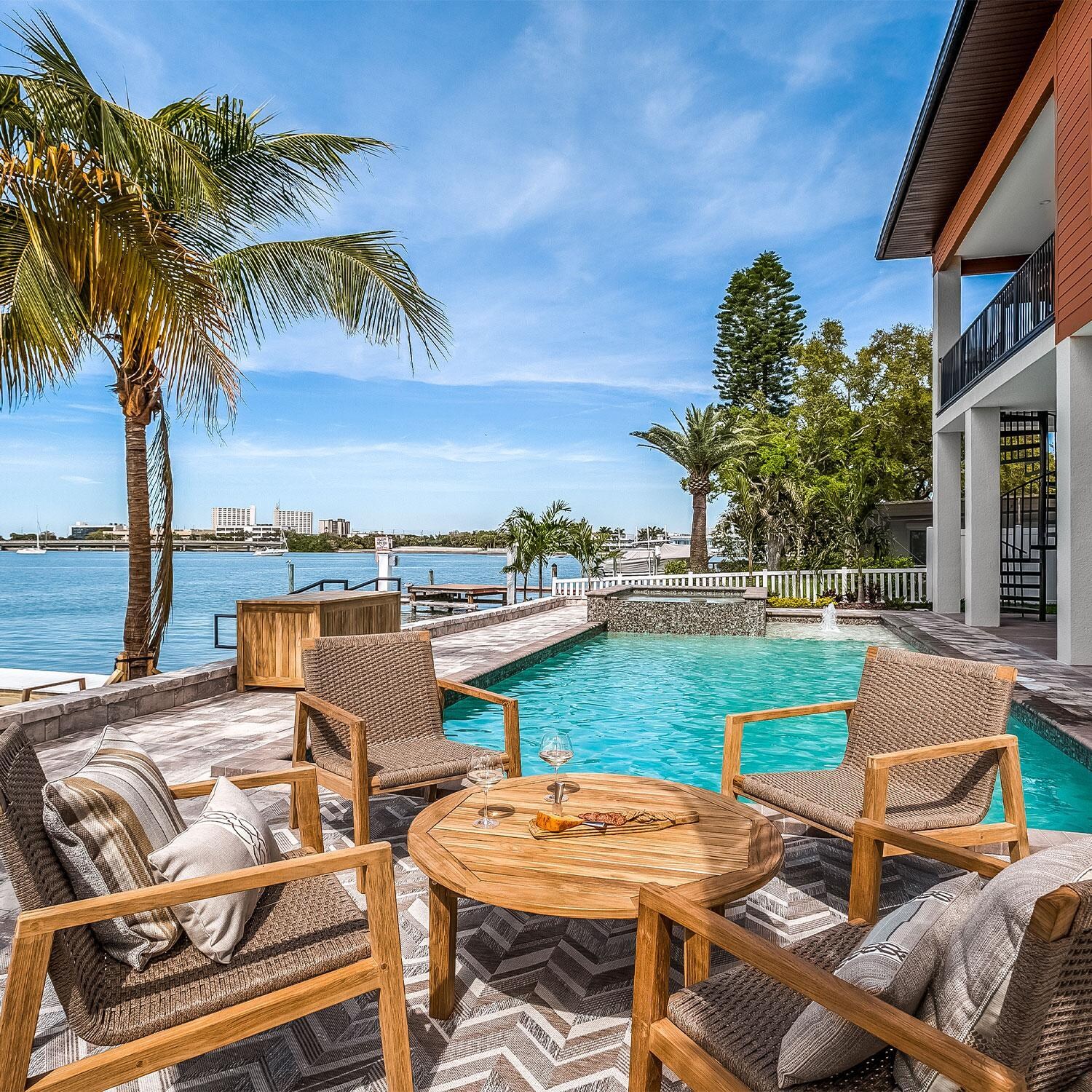 Admiral 5 Pc Conversation Set w/ Round Table in Brown Sand by Royal Teak Collection - By The Pool - Lifestyle thumbnail