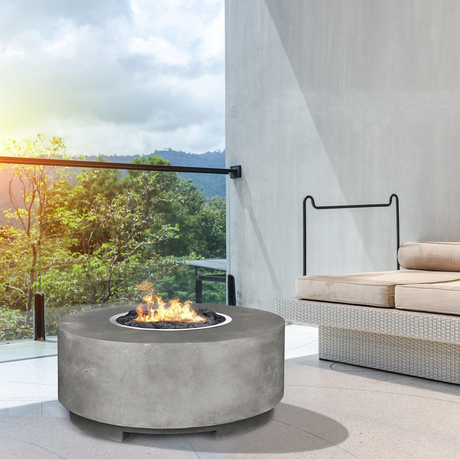 36-in Round Concrete Natural Gas Fire Pit in Limestone by XO Appliance - On Balcony - Shown in Gray finish - Lifestyle thumbnail